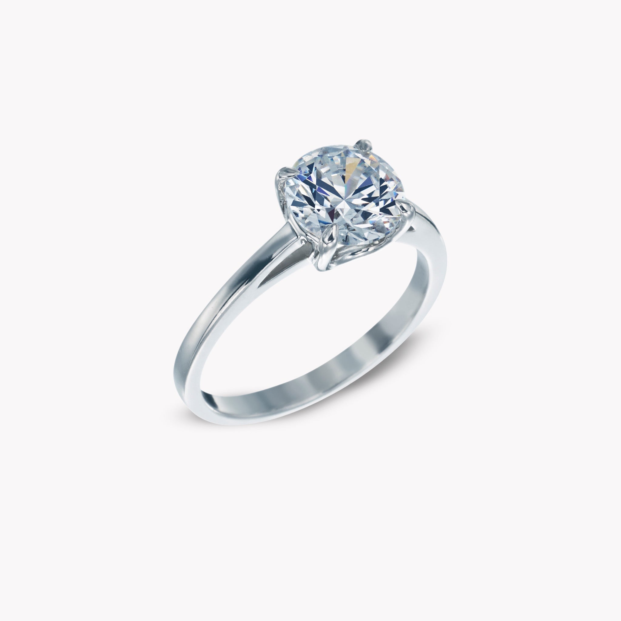 4 Prong Solitaire Ring