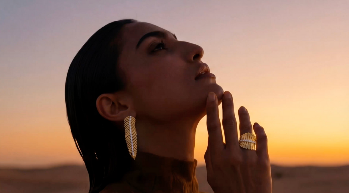 Model at sunset wearing DANI diamond earrings and rings