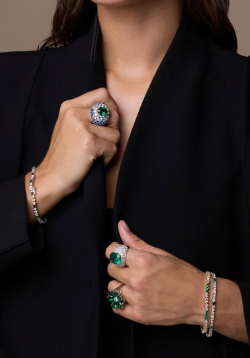 Model wearing DANI emerald cocktail rings and tennis bracelets – Glamour collection